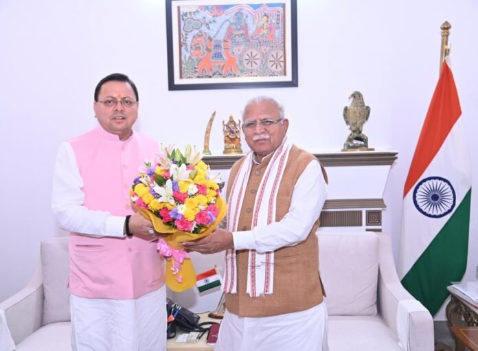 Chief Minister Pushkar Singh Dhami with Union Power Minister Manohar Lal Khattar