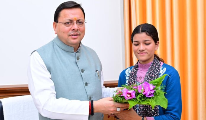 Pushkar Singh Dhami with Priyanka Negi Gram Pradhan of Sarkot