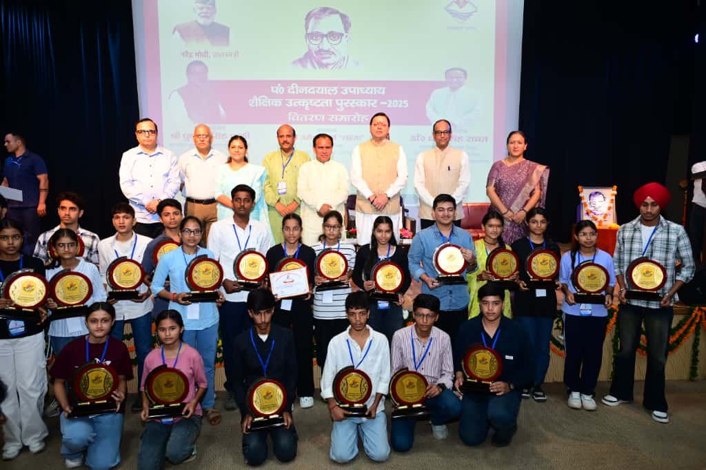 Chief Minister Pushkar Singh Dhami honouring meritorious students of board examinations