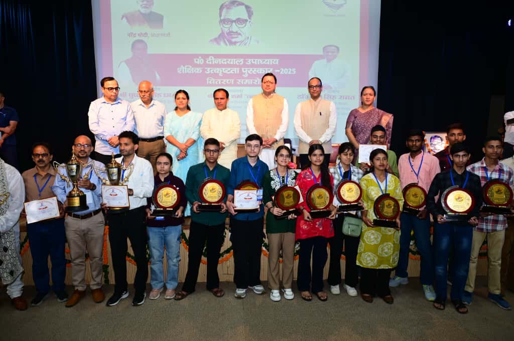 Chief Minister Pushkar Singh Dhami honouring meritorious students of board examinations