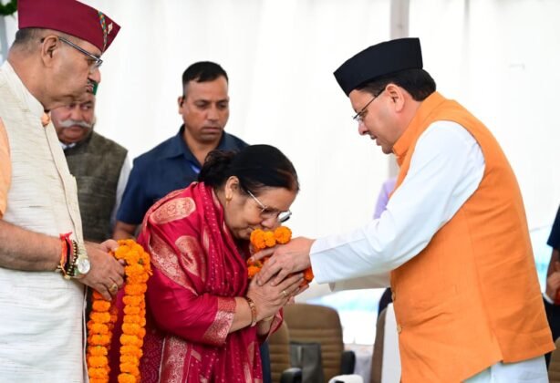 CM Pushkar Singh Dhami with the kins of the martyrs of the Mussoorie firing incident.