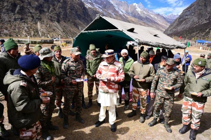 Pushkar Singh Dhami with Indo-Tibetan Border Police (ITBP) personnel in Pithoragarh Pushkar Singh Dhami with Indo-Tibetan Border Police (ITBP) personnel in Pithoragarh