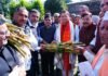 Uttarakhand Raises Sugarcane Price For 2025–26 Season Pushkar Singh Dhami with sugarcane farmers