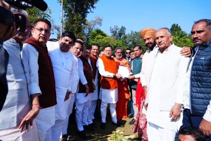 Sugarcane farmers meet Pushkar Singh Dhami